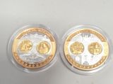 two gold and silver coins with a picture of the president and the first lady
