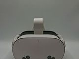 a close up of a white virtual reality headset on a white surface