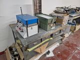 many boxes and boxes on a table in a room