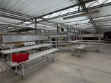 a large room with a lot of tables and benches