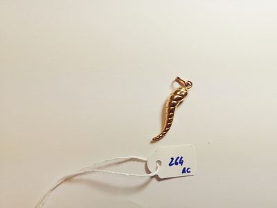 a picture of a piece of jewelry on a white surface