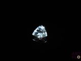 a blue diamond on a black background