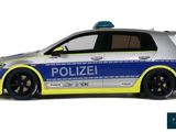 a police car that is parked on the side of the road