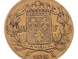 Gros plan sur une pièce d'or ornée d'une couronne