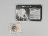 a picture of a coin and a card on a table
