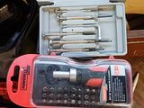 a lot of tools that are sitting on top of a table