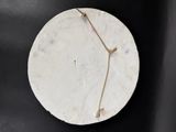 a clock that is on the wall on the table