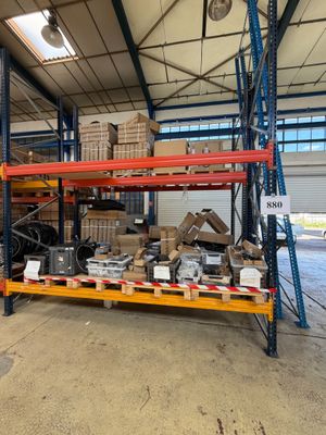 a large warehouse with a lot of boxes on the shelves
