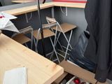 a table with a bunch of apples in the middle of it