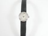 an image of a woman ' s wrist watch with a diamond bezel