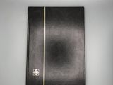 an image of a black book with a gold line