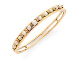 un bracelet doré et blanc orné de perles et de diamants