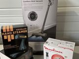 a box with a remote, a box with a microphone, and a box with a box with a remote