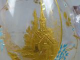 a glass vase with a picture of a church inside of it