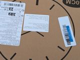 a cardboard box that has a clock on it