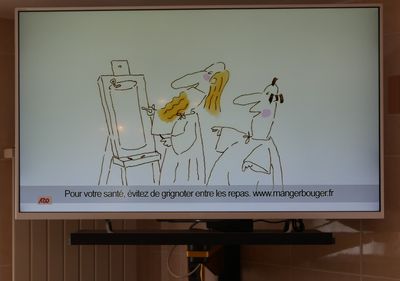 un dessin sur l'écran d'un téléviseur dans une pièce