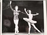 an old black and white photo of a couple of ballerinas