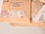a pile of mail that has a bunch of stamps on it