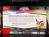 a box with a picture of a pokemon figure inside of it