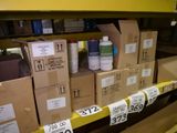many boxes on the shelves of a store with labels on them