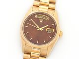 rolex a lady ' s 18ct gold automatic calendar wristwatch