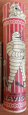 an old tin canister with a picture of a cartoon character on it