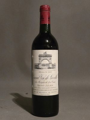 a bottle of wine that is sitting on a table
