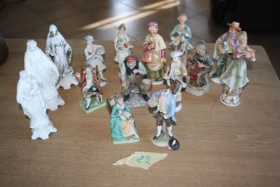 many figurines that are sitting on a table