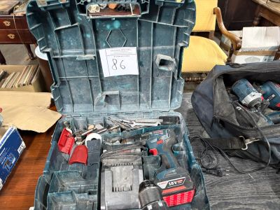 a tool case with tools inside of it on a table
