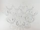a lot of empty wine glasses sitting on a table