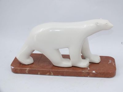 marble polar bear figurine on a marble base on a white background