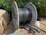 two spools that are sitting on the ground next to each other