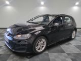 a picture of a black car parked in a garage