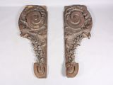 pair of antique carved wood corbs with scrolls and scrolls