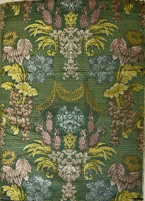 an image of a green and yellow floral wallpaper