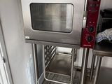 an image of a stainless steel oven in a kitchen