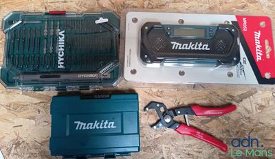 two tools that are sitting next to each other on a table