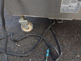 an image of a close up of a machine with a hose attached to it