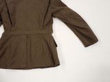 the back of a brown jacket is shown on a white background