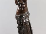 a statue of a woman holding a baby in her arms