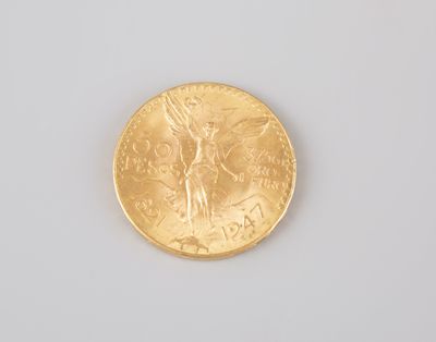 an image of a gold coin sitting on top of a white surface