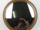 a person taking a picture of themselves in a mirror