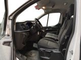 the interior of a truck with the door open and the driver ' s seat down