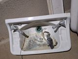 a sink that has been left in the bathroom