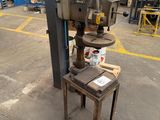 the machine is sitting on the table in the warehouse