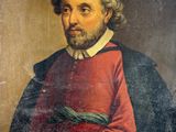 an old painting of a man with a beard holding a book