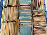 an image of a blue crate filled with lots of folders