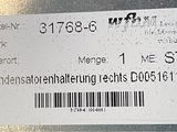 a picture of a name tag on the back of a vehicle