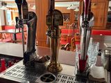 a bar with a bunch of different types of beer on it