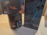 two boxes of food sit on a counter top next to a coffee maker